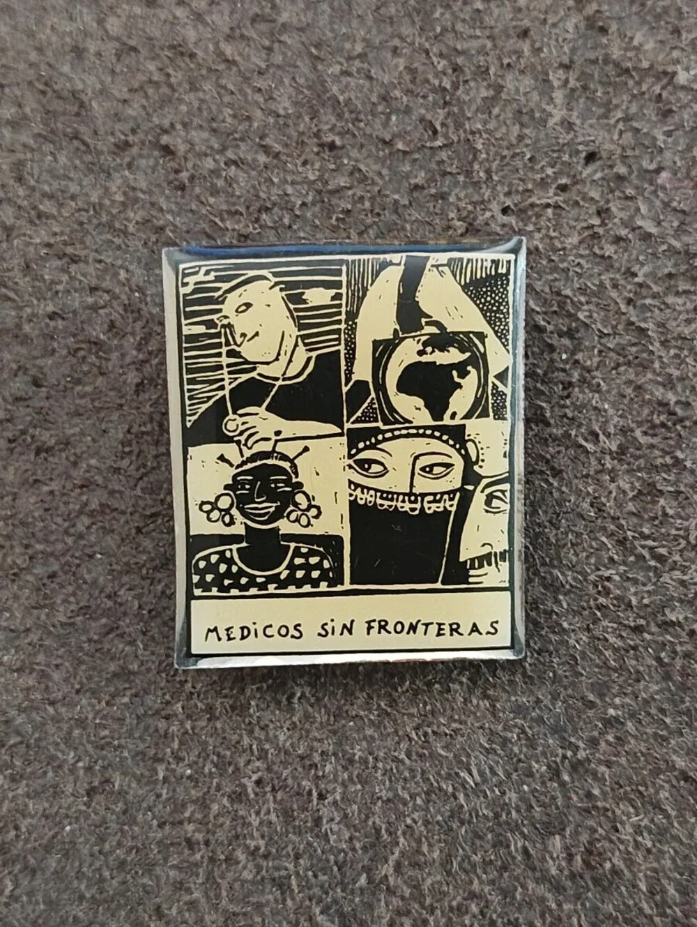 1990s Médicos Sin Fronteras (Doctors Without Borders) Silver Tone Enamel Pin